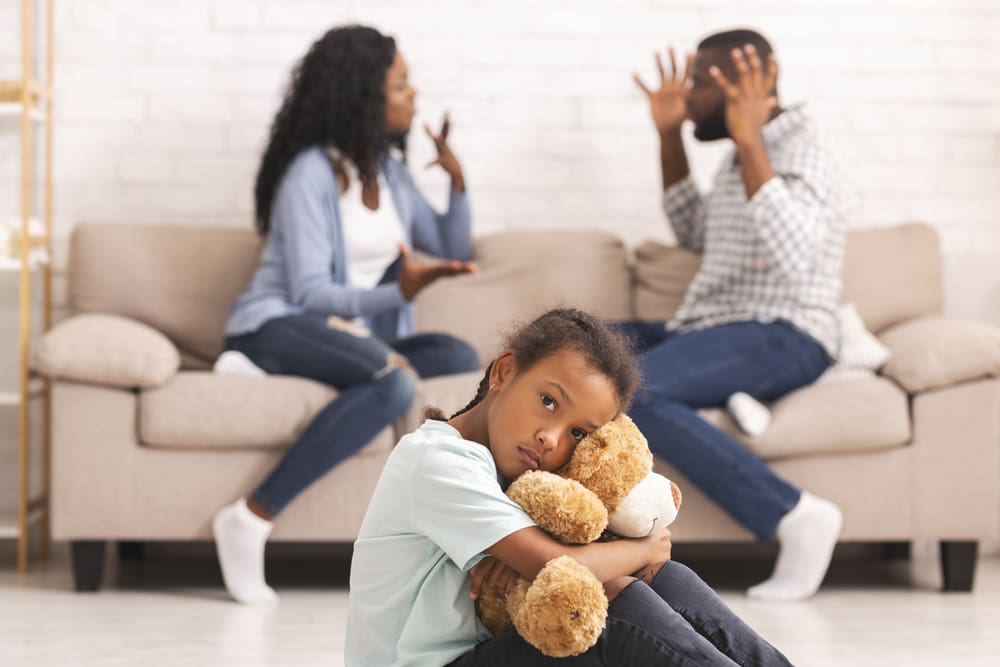 emotional child parents arguing Muslim parents